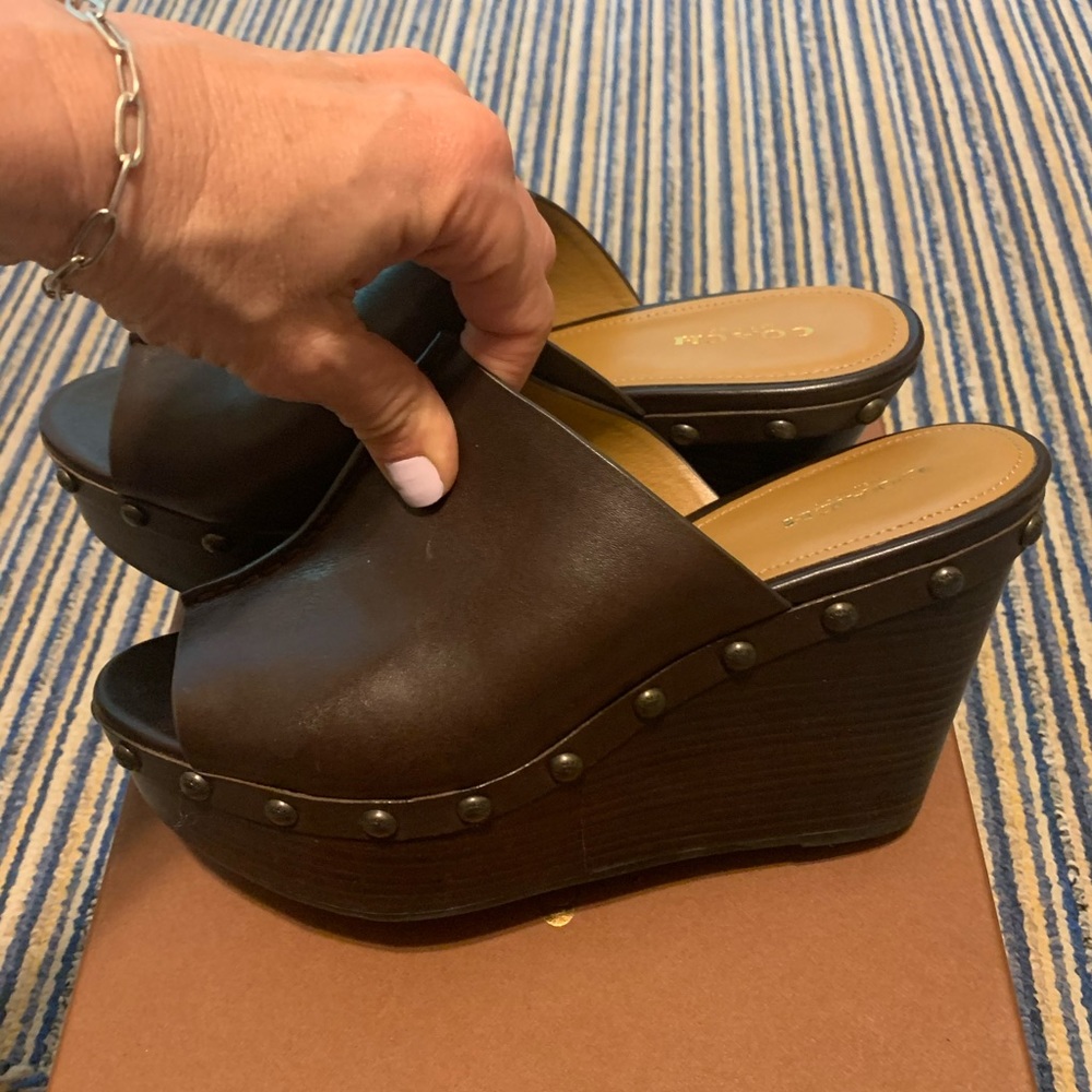 Coach wedges.